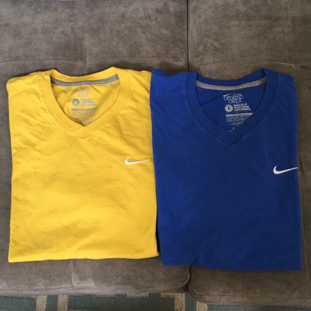 Two Nike V-necks